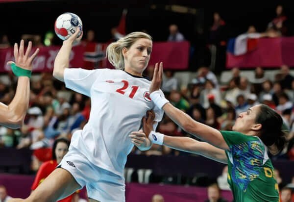 a woman playing handball